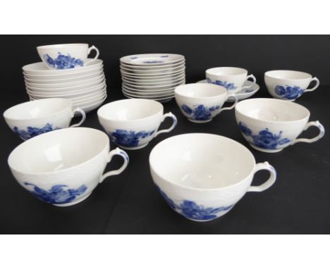 A 33-piece Royal Copenhagen 'Blue Flower #10' china tea service comprising 9 large cups and saucers (3 spare saucers) and 12 