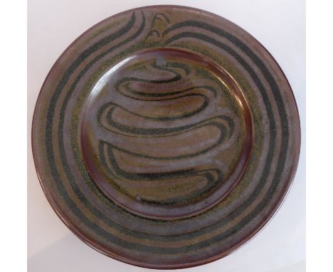 Ray Finch (Winchcombe Pottery, Gloucestershire),&nbsp;charger; combed meander and basket weave decoration through rust slip (