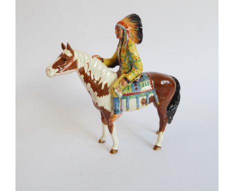 A Beswick ceramic model of a Native American chief on horseback, black printed mark to underside (21.5 cm high)Condition Repo