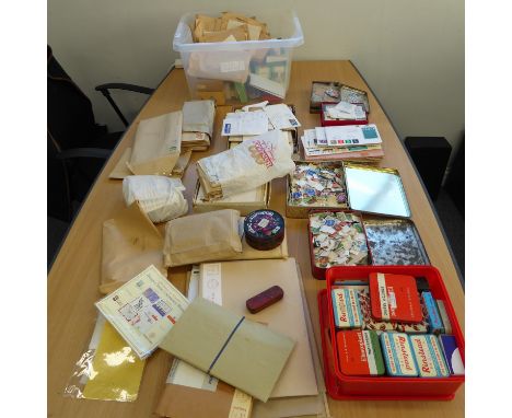 Two boxes of loose stamps in packets and tins, plus First Day Covers etc.