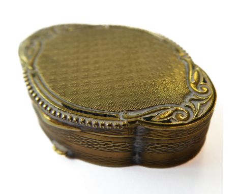 A small late 19th/early 20th century continental quatrefoil-shaped gilded box and hinged cover: very fine engine-turned decor