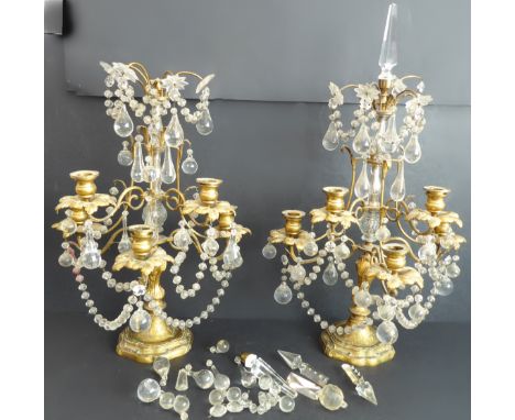 A pair of fine and heavy 19th century gilt-metal and hand-cut&nbsp;glass five-light candelabra centrepieces (some pieces away