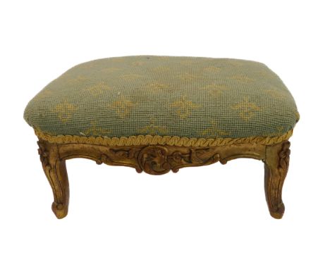 A small 19th century carved gilt-wood footstool in mid-18th century Louis XV style: needlework tapestry top above cabriole-st