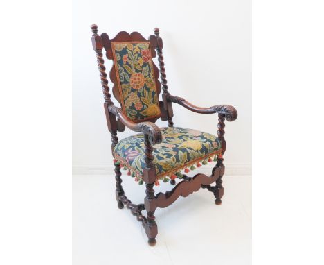 A good late 17th century style (probably late 19th/early 20th century) walnut open armchair: floral, padded tapestry back and