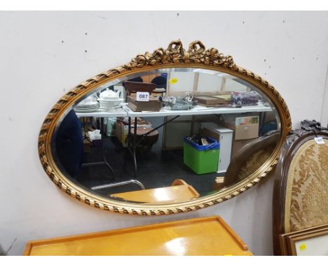 OVAL GILT MIRROR