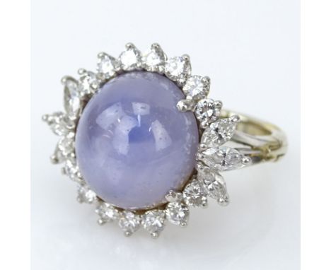 Vintage Approx. 20.0 Carat Cabochon Star Sapphire, 2.0 Carat Round Brilliant Cut Diamond, Platinum and 14 Karat Gold Ring. Di