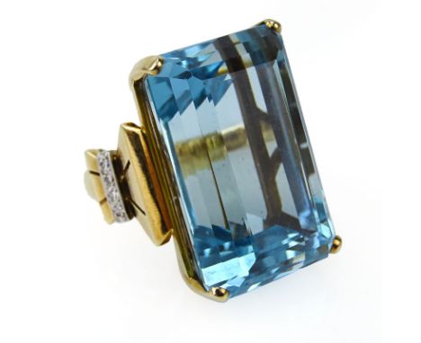 Vintage Approx. 60.0 Carat Emerald Cut Aquamarine, 14 Karat Yellow Gold and Platinum Ring. Aquamarine with good saturation of