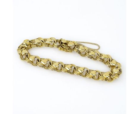 Vintage 14 Karat Yellow Gold Charm Bracelet. Stamped 14K. Good condition. Measures 7" L, 3/8" W. Approx. weight: 18.9 grams. 