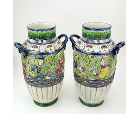 Pair of Antique Teplitz Amphora Polychrome Art Nouveau Pottery Vases. Decorated with King and queen high relief on front and 