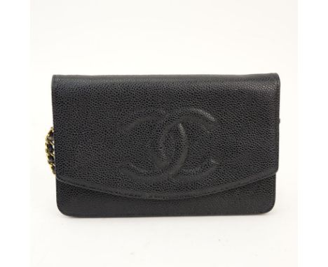Vintage Chanel Small Black Leather CC Flap Bag. With Gold and leather chain strap. Interior with slot and zipper pockets. Mar