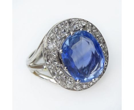 Approx. 6.77 Carat Oval Cut Natural Unheated Sapphire, Diamond and Platinum Ring. Signed plat and French hallmarks. Ring size