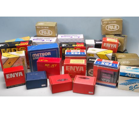 A collection of vintage motor engine empty boxes to include Fuji, Enya, Meteor, Fox, MDS etc. 8cm x 18cm x 60cm