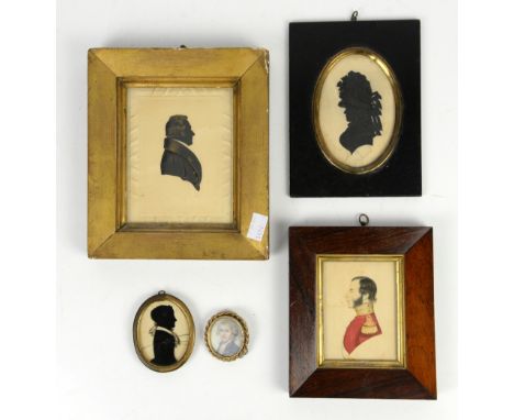Early 19th century portrait miniature of an officer, 4cm, three silouettes and a portrait of a young man in uniform          
