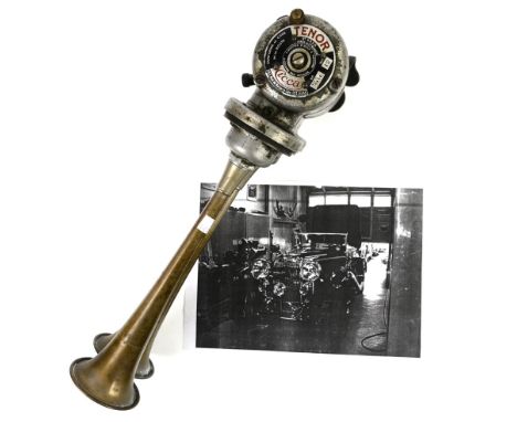 A French CICCA 'Tenor' two tone 6 volt vehicle horn, with an 28cm) long nickel-plated trumpet and a 8cm throat, ( We believe 