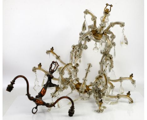 20th century gilt metal and cut glass eight light chandelier, with glass droplets and applied floral decoration, H.66cm Diame