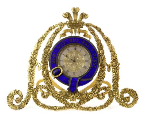 Gilt metal strut clock in the form of scrolling flowers and foliage and with Prince of Wales Feathers finial, retailed by Lon