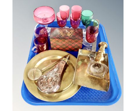 A tray of 20th century coloured glass ware, wooden card box, antique metal ware, shot flask, scoup, candlestick etc 