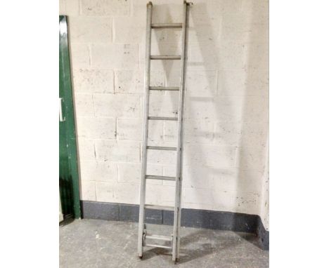 A twin section aluminium ladder 