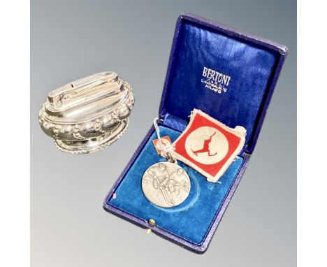A Ronson 'Crown' table lighter, together with a sporting medallion 