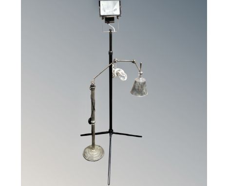 A contemporary industrial style angelfish floor lamp together with a site light on tripod stand 