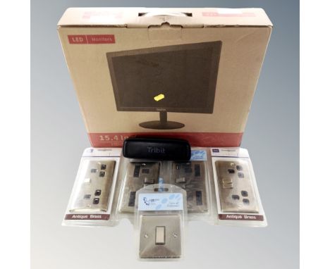 A 15 inch HD 154 LED monitor, boxed together with a box containing five assorted light and socket switches, new, and a Tribit