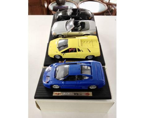 Four Maisto die cast vehicles : Lamborghini Diablo 1990, Porsche 911 Speedster 1989, Bugatti 1992, Mercedes Benz 500 SL 1989,