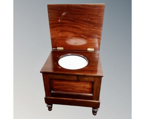 A Victorian mahogany fitted commode 