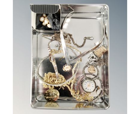 A tin of gilt and silvered jewellery, silver and enamel fob watch, Mexican silver choker, 9ct and silver band, 9ct back and f