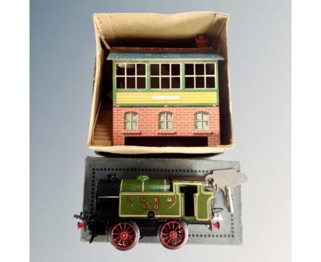 A Hornby Series LNER 460 tin plate clockwork engine with key and a further Hornby Series tin plate signaling building, both p