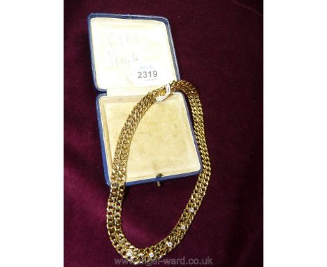 A Double Chain Link Necklace with Crystal Stones.