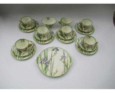A Royal Doulton Art Nouveau tea service, comprising six cups, saucers, side plates, sugar bowl and bread and butter plate - A