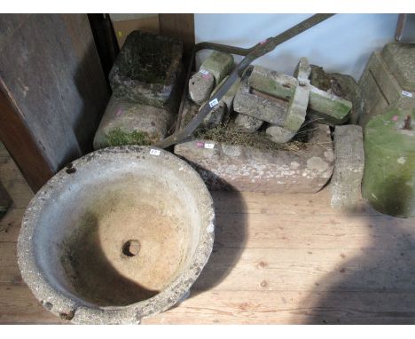 A collection of garden items, to include a trough, roller etc