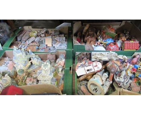 Four boxes of ornaments including model cottages etc