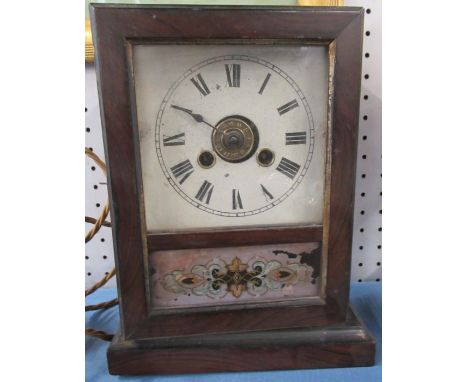 An American mantel clock, with square dial and decorative glass panel