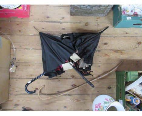 Two vintage parasols and a cane