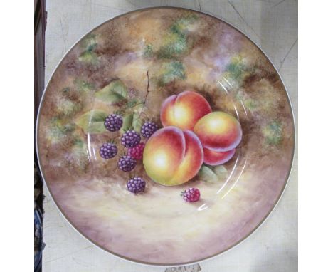 A Royal Worcester plate, decorated with fruit to a mossy background by J Smith, diameter 10.5ins -&nbsp;- Good condition