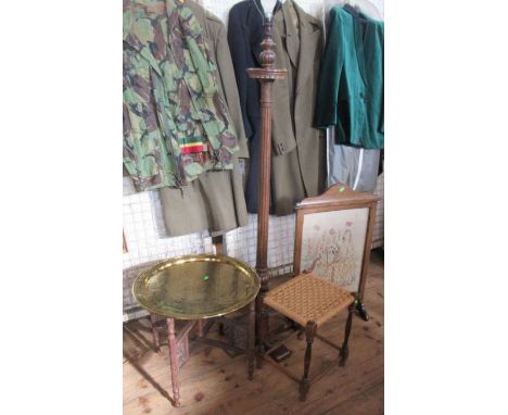 A brass topped Eastern style table, diameter 22ins, together with an oak lamp standard, a wicker topped stool and a tapestry 