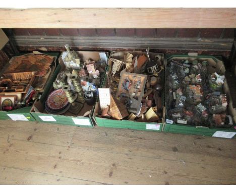 Four boxes of assorted ornaments, china, model cottages etc