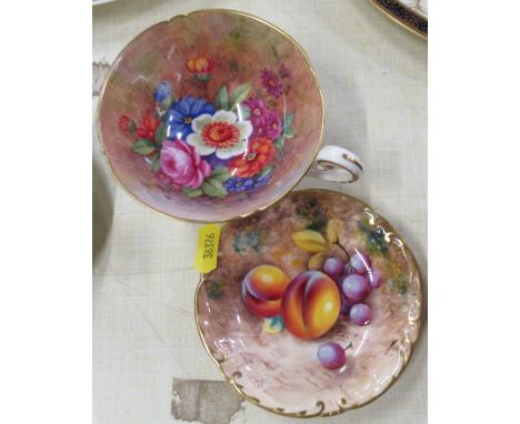 A Royal Worcester cup, the interior decorated with flowers by Barker, together with a Royal Worcester dish, decorated with fr