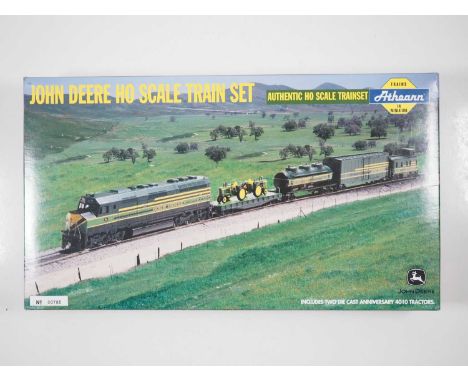 An ATHEARN John Deere HO gauge 4th Collector's Edition Anniversary 4010 train set comprising F45 locomotive, 40' Flat Car wit