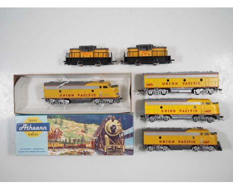 A group of boxed and unboxed American outline HO gauge diesel locomotives by ATHEARN and others comprising various F7s and a 