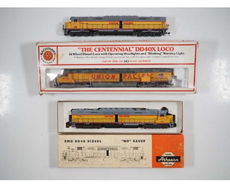 A group of HO gauge American outline diesel locomotives in Union Pacific livery comprising boxed and unboxed examples of ATHE