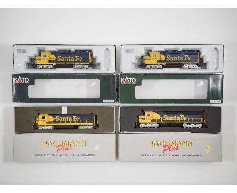 A pair of KATO American outline HO gauge GP35 diesel locomotives together with another pair of similar BACHMANN diesels all i