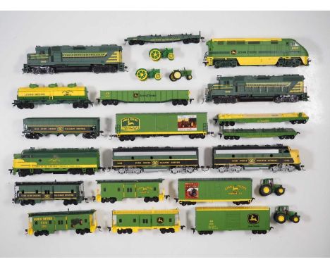 A group of unboxed HO gauge American outline locomotives and rolling stock from the ATHEARN limited edition John Deere Railwa