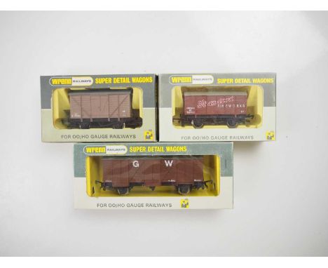 A group of rarer issue WRENN OO gauge vans comprising W4318X in light brown, W5049 with white lettering and W4313P in brown i