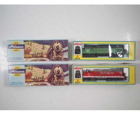 A group of American outline HO gauge diesel locomotives by ATLAS and ATHEARN all in Burlington Northern livery - VG in G boxe