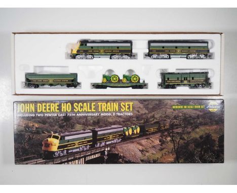 An ATHEARN John Deere HO gauge 2nd Collector's Edition train set comprising F7A and F7B locomotives (one powered and one dumm