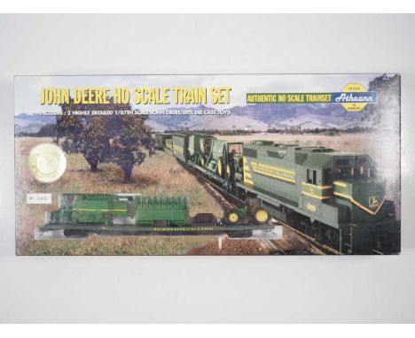 An ATHEARN John Deere HO gauge 3rd Collector's Edition train set comprising GP38 locomotive, Flat Car with combine harvester 