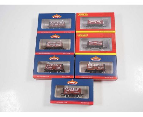 A group of BACHMANN and HORNBY OO gauge mixed livery wagons - VG/E in VG boxes (7)