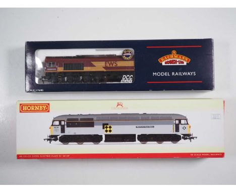 A pair of OO gauge diesel locomotives comprising a BACHMANN 32-730 class 66 'Railway Heritage Committee' in EWS livery and a 